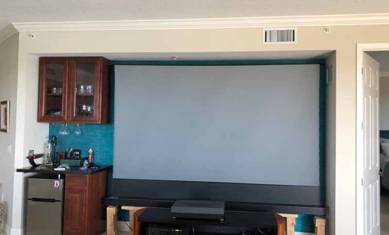 VividStorm-120-ALR-UST-riser-screen_sunny-day_projector-off