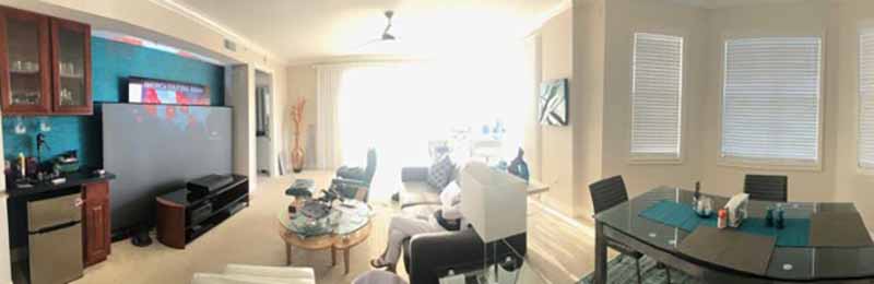 Optoma-CinemaX-P1_LivingRoom-late-afternoon-full-sunlight_coming-into_room