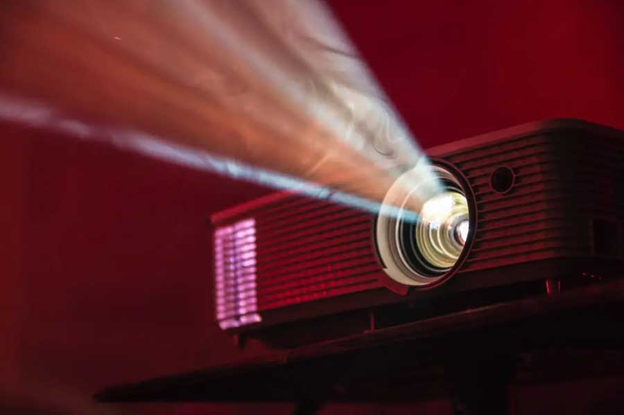 Calculate the amount of lumens required for the video projector